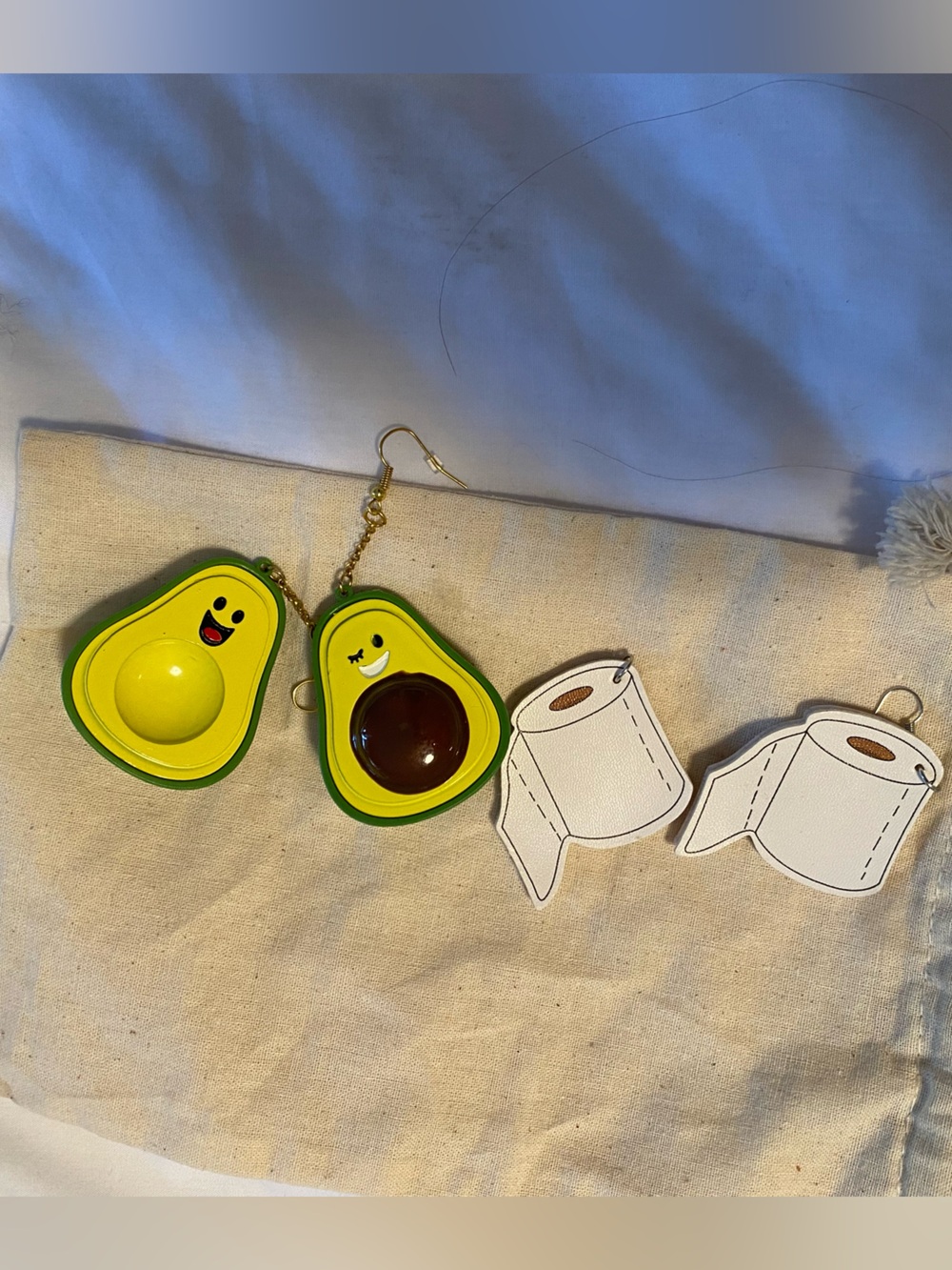 Novelty earrings - two pair. Large 3D avocado halves with faces & toilet paper